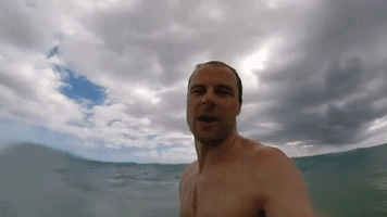 Unsuspecting Man Gets Hit by Big Wave in Hawaii