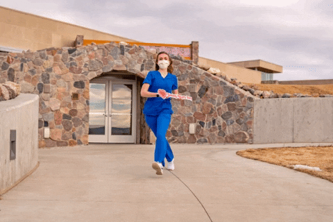 Nurse Jumping GIF by University of Mary
