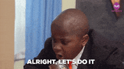 Celebrity gif. Robby Novak as Kid President, dressed in a smart black suit and red tie, furrows his brow and speaks into a metal can, "Alright, let's do it," before confidently overturning the can onto the table and stepping back with conviction.
