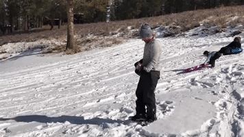 Man Fails at American Football Attempt in Snow