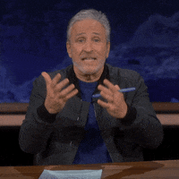 TheProblemWithJonStewart tv idk shrug hmm GIF