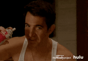TV gif. Chris Messina as Danny Castellano on The Mindy Project holds a can of whipped cream up and then squirts it directly into his mouth. He looks over at someone with his mouth open, full of whipped cream.