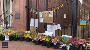Flowers, Flags and Messages of Support Left Outside Ukrainian Embassy in DC