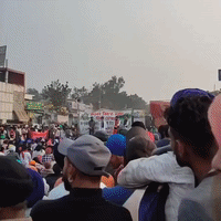 Farmers Continue Delhi Sit-In as Nationwide Strike Held