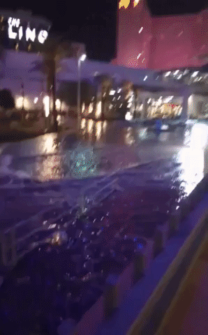 Car Battles Rushing Floodwater Near Las Vegas Strip