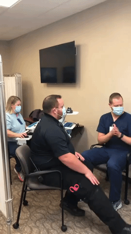 Emergency Medical Worker Proposes to Nurse Boyfriend During COVID Vaccine Appointment