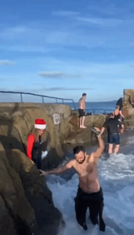 Dublin Swimmers Brave Icy Temperatures for Christmas Day Dip