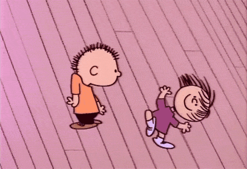 Peanuts gif. Two Peanuts characters dance around wildly, probably to the musical tinklings of Schroder.