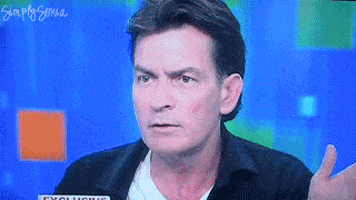 Celebrity gif. Charlie Sheen rolls his eyes and puts his hands up in a dismissive gesture as if to say, “Whatever.”