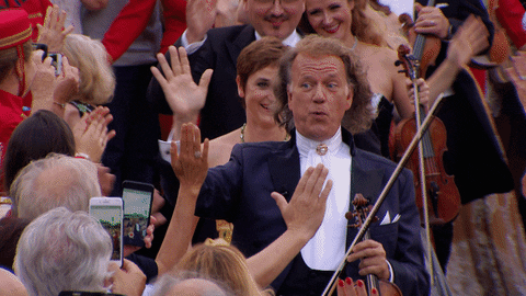 andrerieu giphyupload win concert high five GIF