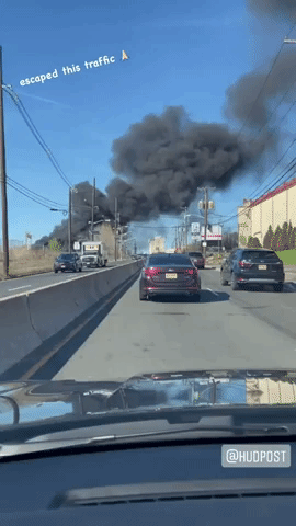 Large Smoke Plume Rises as Transit Buses Burn in New Jersey