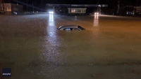 Car Barely Visible Above Floodwaters in Central Alabama