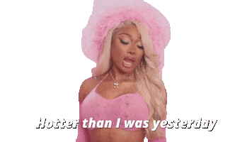Sticker gif. Megan Thee Stallion struts seductively toward us over a transparent background wearing a pink feathered hat. Text, “Hotter than I was yesterday.”