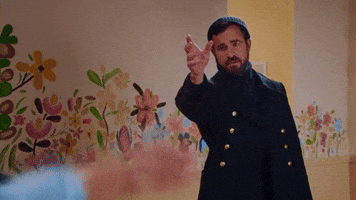 TV gif. In a scene from At Home with Amy Sedaris, Justin Theroux as the sea captain slides away dramatically with an arm outstretched, while another outstretched arm in the foreground reaches out to him.