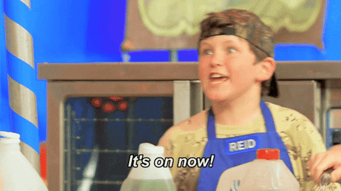Reality TV gif. A young contestant on MasterChef Junior nods his head enthusiastically with wide eyes as he says, "It's on now!"