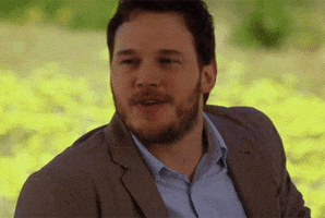 Movie gif. Chris Pratt as Doug in "Movie 43," wearing a sport coat, nods and then leans forward on his arm, looking quizzical and asking "What?"
