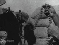 NationalWWIMuseum black and white shooting military footage GIF