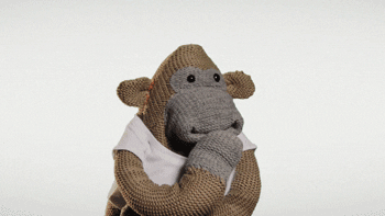 Video gif. A nervous monkey puppet bites his nails and shakes in apprehension.