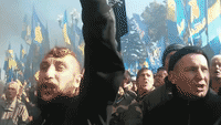 Demonstators and Police Clash Outside Parliament Building in Kiev