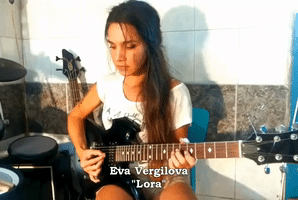 Woman Shreds It on the Electric Guitar