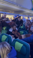 Irish Band Entertains Travelers on Flight