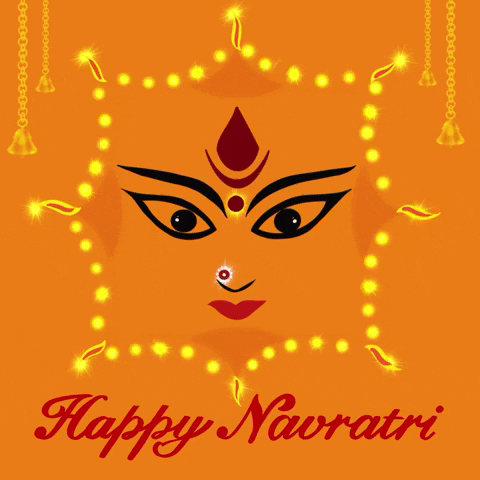 Illustrated gif. Face of the Goddess Durga with cat eyes and sparkling jewels glares at us from within a frame of flashing golden lights. Text, "Happy Navratri."