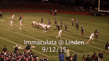 Football Player Hits Opponent With Helmet
