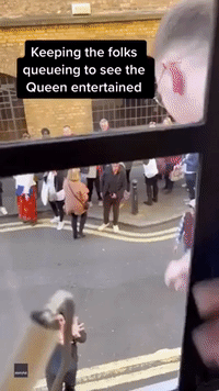 'Gin and Tonic?' Queue for Queen Kept Entertained by Office Antics