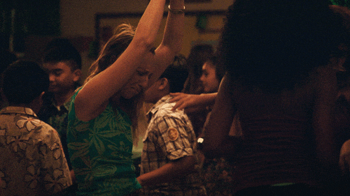 TV gif. Taking herself too seriously, Anna Konkle as Anna in pen15 does a dorky dance on the dance floor.