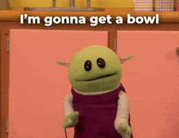 TV gif. Mona A-Go-Go from Nanalan spreads their arms and says, “I'm gonna get a bowl for cereal.”