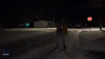Michigan Man Ice Skates Down Frozen Road