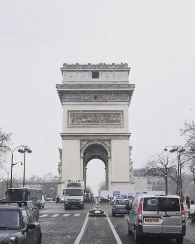 Snow Falls on the Arc de Triomphe as European Cold Spell Hits France