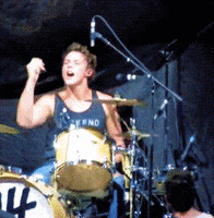 ashton irwin GIF