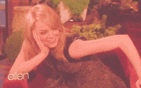 emma stone laughing GIF