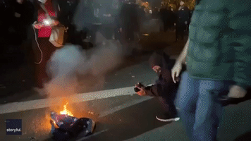 Vancouver Protesters Burn US Flag After Police Shooting