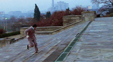 disney shrug GIF