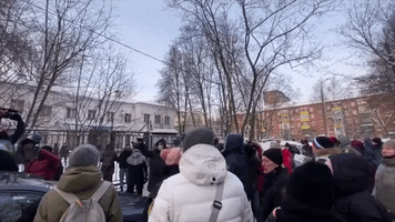Navalny Supporters Chant 'Freedom' Outside Police Station