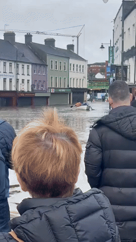 Locals Paddle Rowboat Through Flooded Northern Ireland Town Ahead of Storm Ciaran's Arrival
