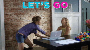 Movie gif. Kate Hudson as Jesse and Britt Robertson as Kristin in Mother's Day Movie. Kristin is pulling Jesse up from a chair and Jesse clearly doesn't want to go, which makes Kristin pull her hard.