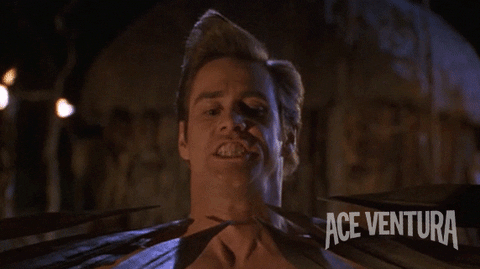 confused jim carrey GIF