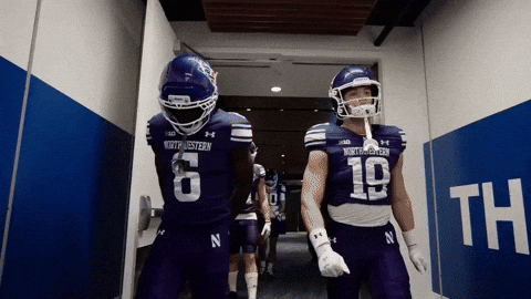 College Football Fist Bump GIF by Northwestern Athletics