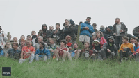 Competitors Tumble Down English Hill as Cheese-Rolling Event Returns