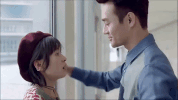 kisses huan le song GIF