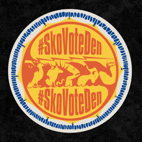 Digital art gif. Sticker of a yellow and blue Native American drum featuring a row of animals, including eagles, elk, deer, fish, bear, and buffalo, shakes against a black background. Text, “#SkoVoteDen.”