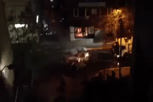 Police Spray Barricade With Water Cannon