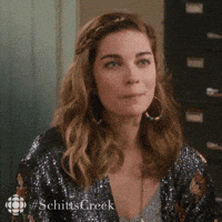 Schitts Creek Shrug GIF by CBC