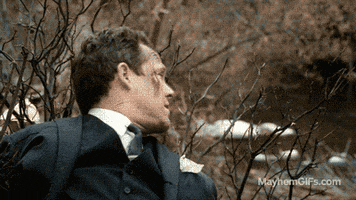 Ad gif. Dean Winters as Mayhem for Allstate Insurance. He's lying in brambles next to a river and he looks behind him before turning back and closing his eyes in annoyance, saying, "Ugh."