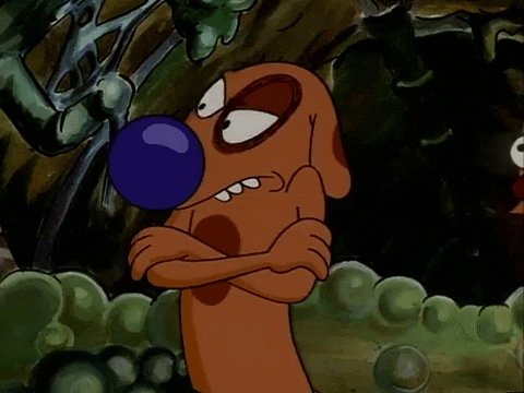 Cartoon gif. Dog, from CatDog, appears annoyed, blinking emphatically and frowning with his arms crossed.
