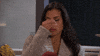 Reality TV gif. A woman on the Bachelor in a gray sweater pinches the bridge of her nose in frustration.
