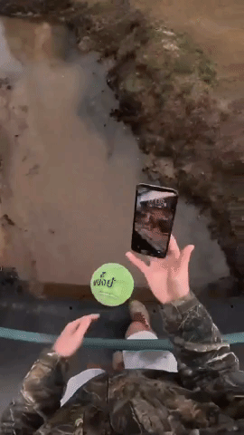 Juggling Phone Over Bridge